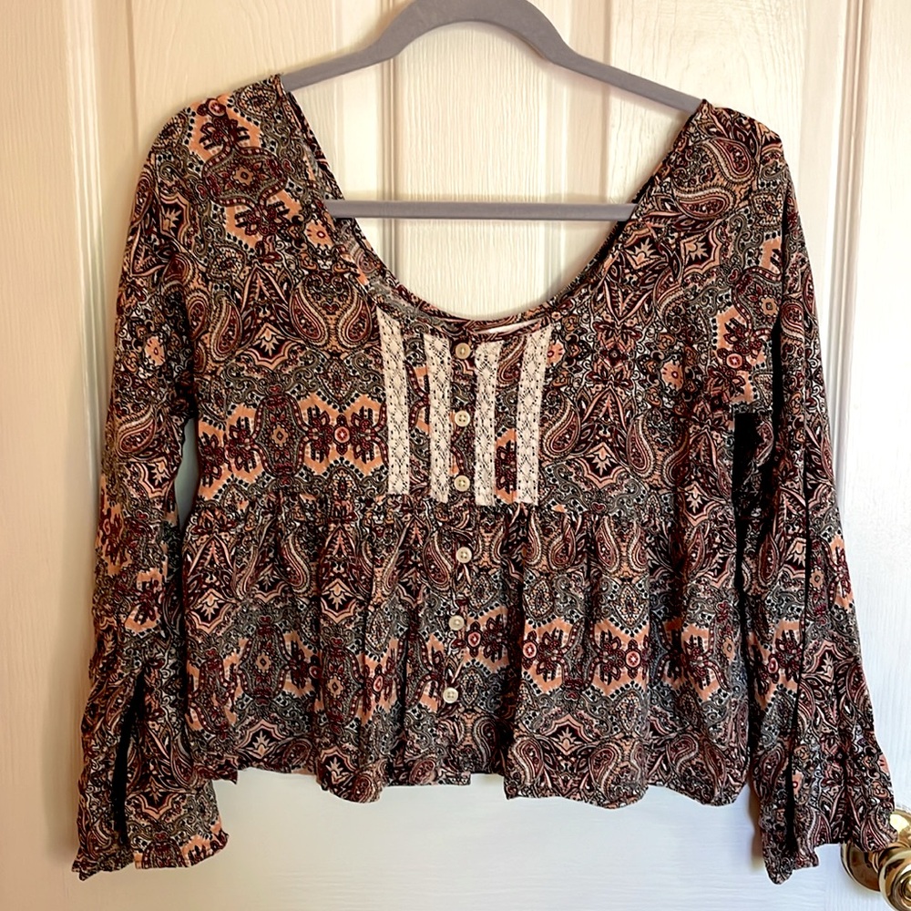 Cropped long sleeved boho ruffle hem top
